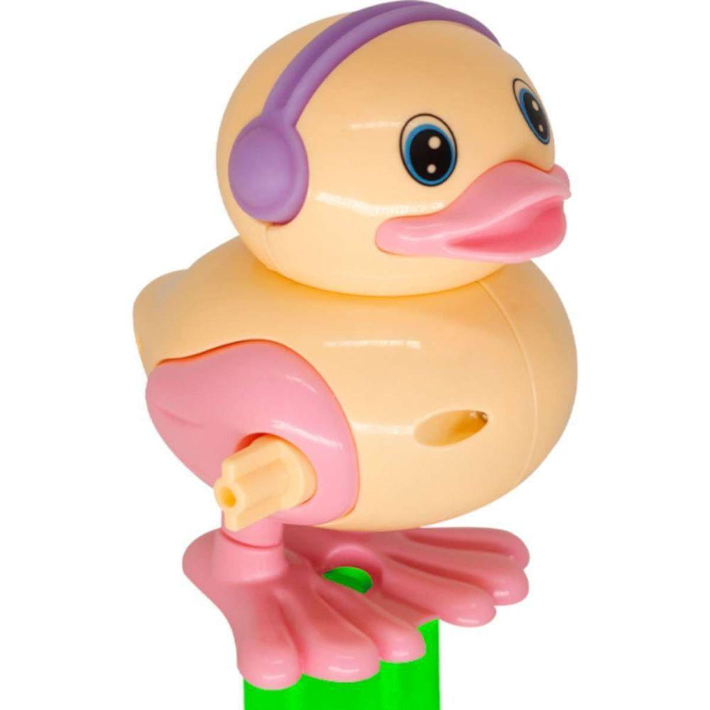 Brinquedo Pato Pula Pula Movido à Corda Variação Pêssego